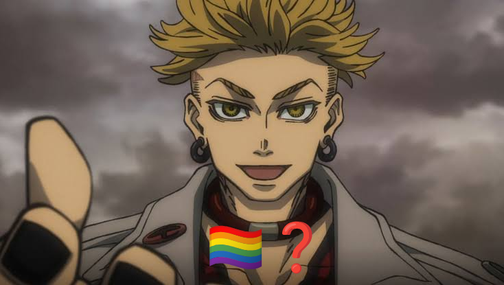 An image of Enjin pointing at the viewer. It's captioned with a gay flag and a questionmark.